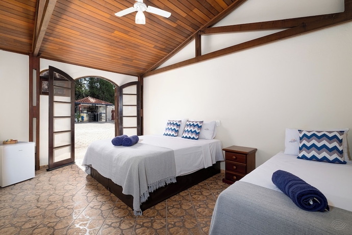 Imagen de la habitación del Hotel Pousada Encantos de Socorro. Foto 1
