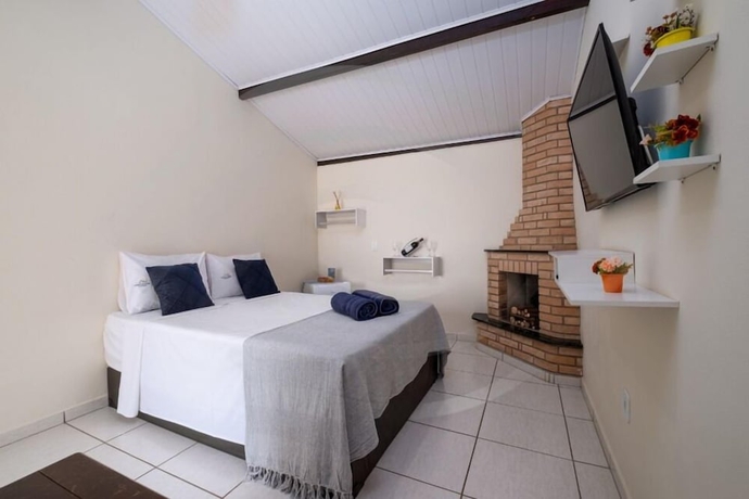 Imagen de la habitación del Hotel Pousada Encantos de Socorro. Foto 7