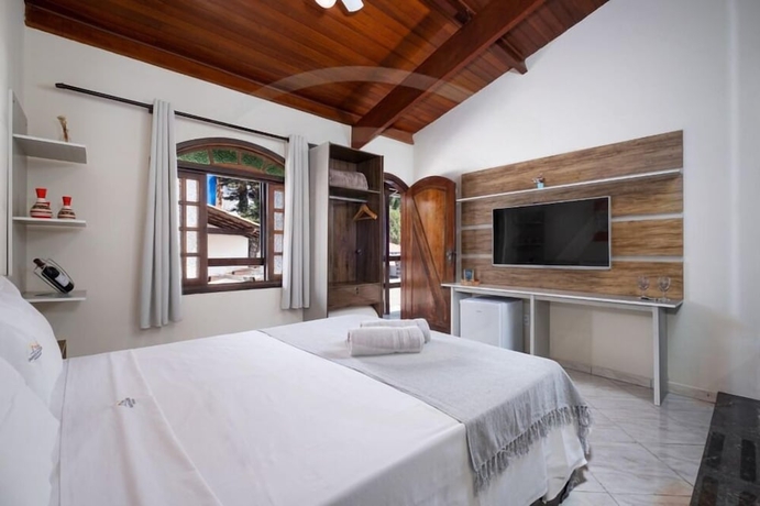 Imagen de la habitación del Hotel Pousada Encantos de Socorro. Foto 9