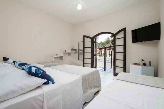 Imagen de la habitación del Hotel Pousada Encantos de Socorro. Foto 15