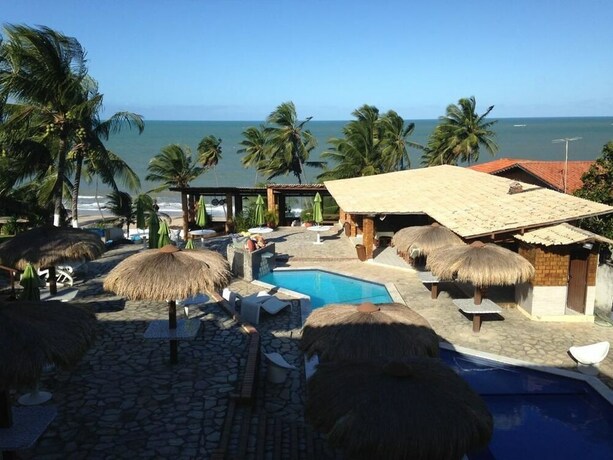 Imagen de la piscina del Hotel Pousada Enseada Do Sol. Foto 31