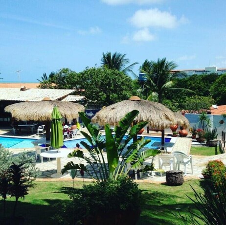 Imagen de la piscina del Hotel Pousada Enseada Do Sol. Foto 32