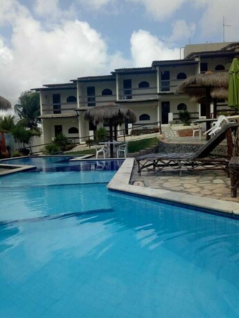 Imagen de la piscina del Hotel Pousada Enseada Do Sol. Foto 34