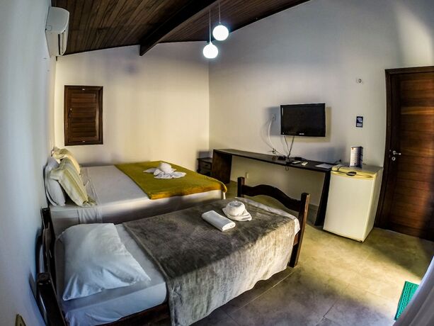 Imagen de la habitación del Hotel Pousada Enseada dos Mares. Foto 12