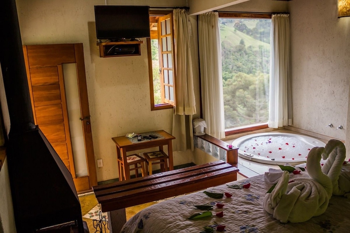 Imagen de la habitación del Hotel Pousada Espelho D&Aacute;gua. Foto 14