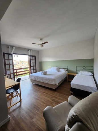 Imagen de la habitación del Hotel Pousada Ess&ecirc;ncia de Minas. Foto 8