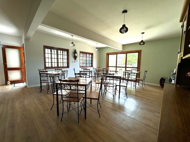 Imagen del bar/restaurante del Hotel Pousada Ess&ecirc;ncia de Minas. Foto 2