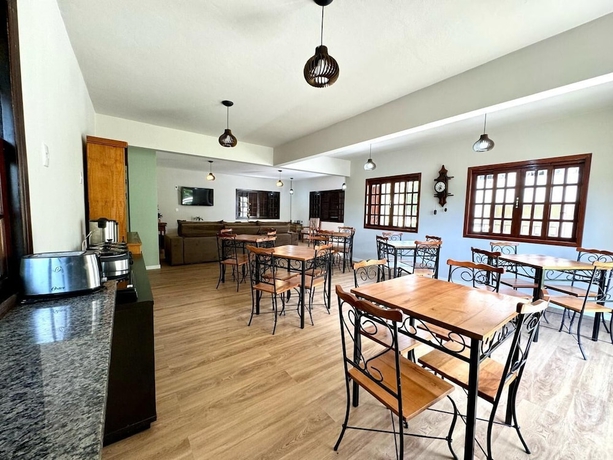Imagen del bar/restaurante del Hotel Pousada Ess&ecirc;ncia de Minas. Foto 3