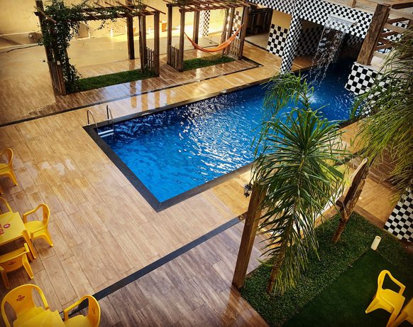 Imagen de la piscina del Hotel Pousada Evolu&ccedil;&atilde;o engenho. Foto 15