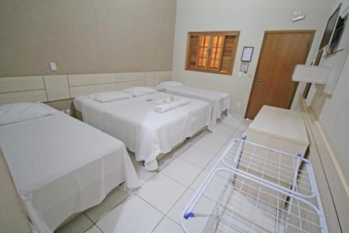 Imagen de la habitación del Hotel Pousada Faruk. Foto 7