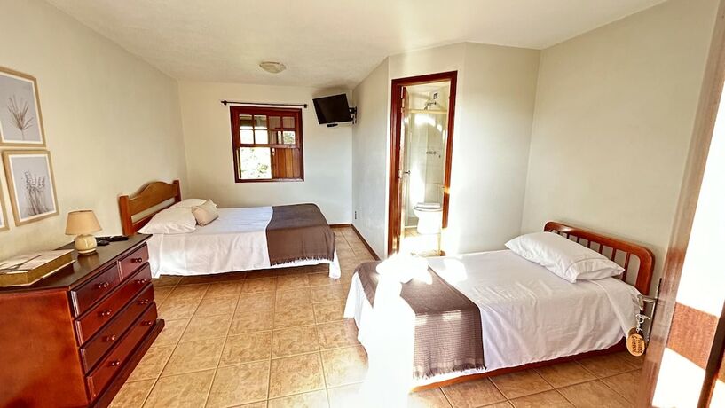 Imagen de la habitación del Hotel Pousada Flor de Lua Monte Verde. Foto 19