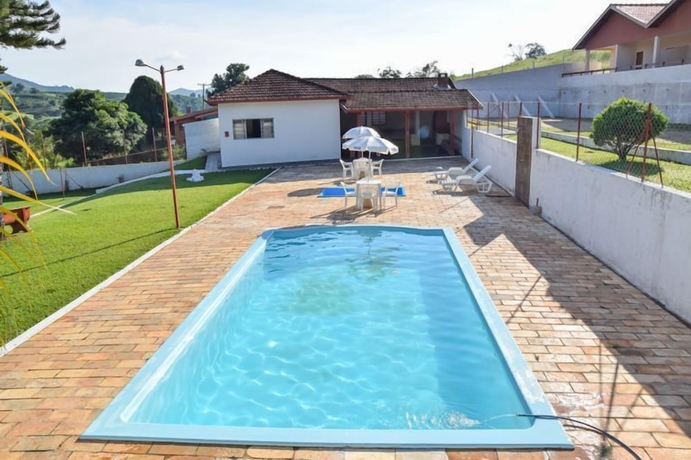 Imagen de la piscina del Hotel Pousada Flores do Campo. Foto 15