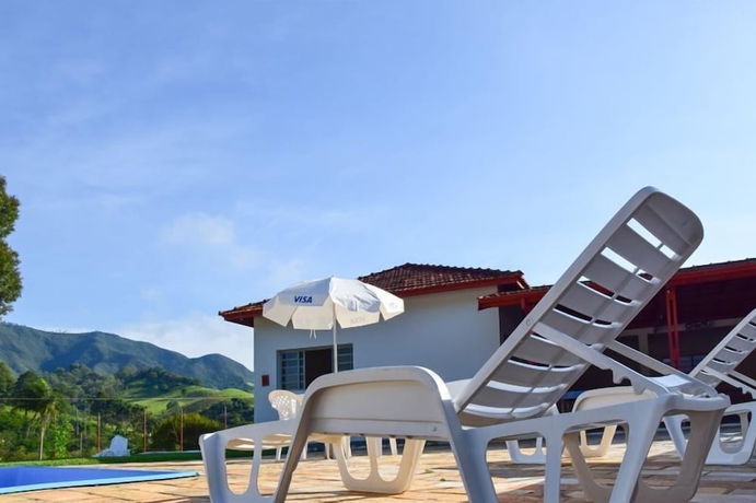 Imagen de la piscina del Hotel Pousada Flores do Campo. Foto 16