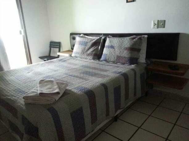 Imagen de la habitación del Hotel Pousada Girassol, R&iacute;o das Ostras. Foto 25