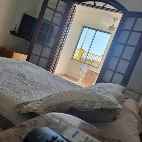 Imagen de la habitación del Hotel Pousada Girassol, R&iacute;o das Ostras. Foto 26