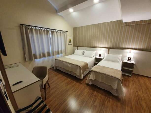 Imagen de la habitación del Hotel Pousada Golden Garden. Foto 12