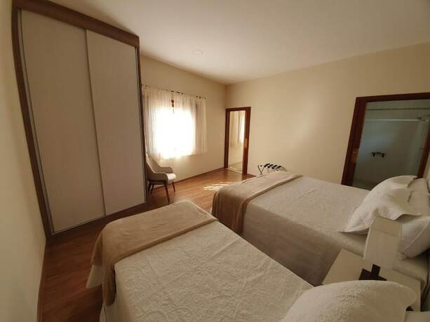 Imagen de la habitación del Hotel Pousada Golden Garden. Foto 15