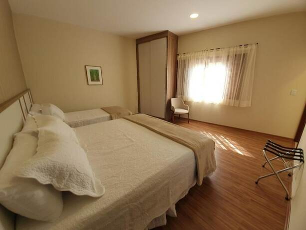 Imagen de la habitación del Hotel Pousada Golden Garden. Foto 19