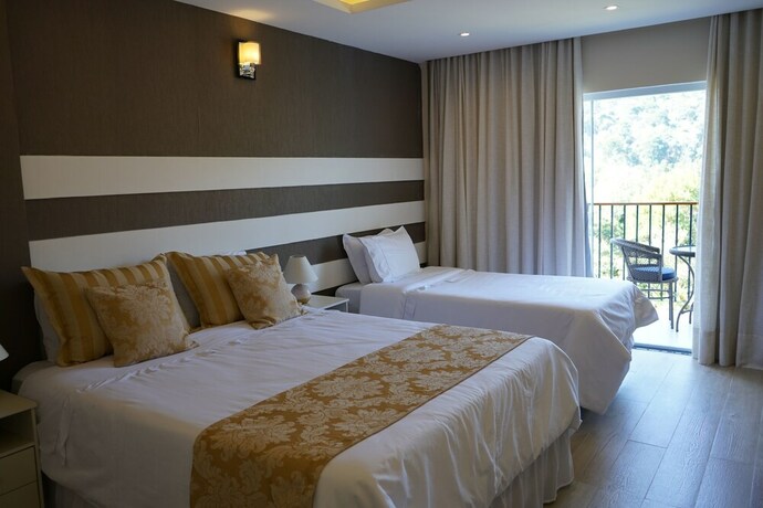 Imagen de la habitación del Hotel Pousada Granja Santa Barbara. Foto 19