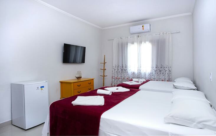 Imagen de la habitación del Hotel Pousada Guarubela Veloso. Foto 11