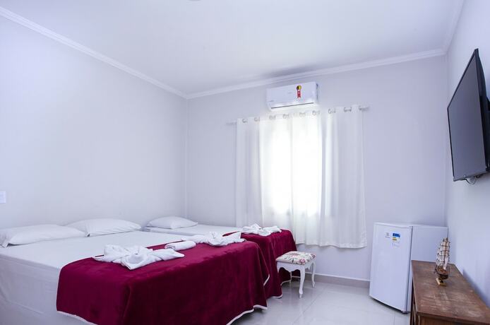 Imagen de la habitación del Hotel Pousada Guarubela Veloso. Foto 14
