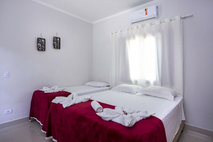 Imagen de la habitación del Hotel Pousada Guarubela Veloso. Foto 15
