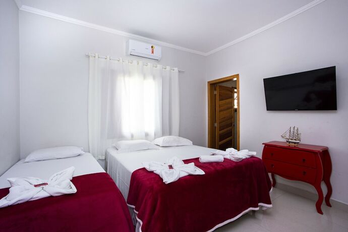 Imagen de la habitación del Hotel Pousada Guarubela Veloso. Foto 17