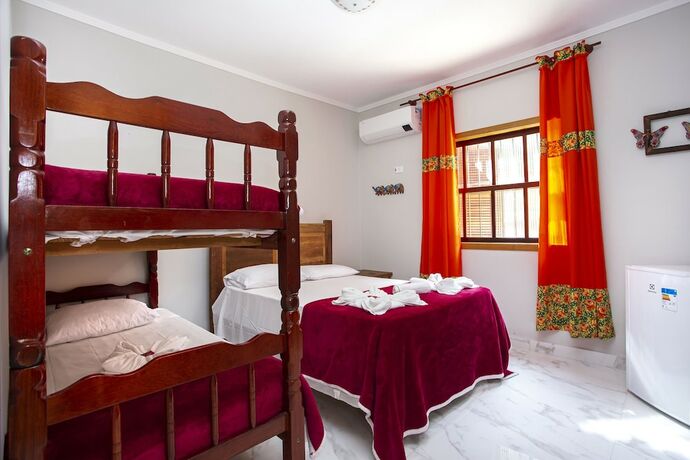 Imagen de la habitación del Hotel Pousada Guarubela Veloso. Foto 18