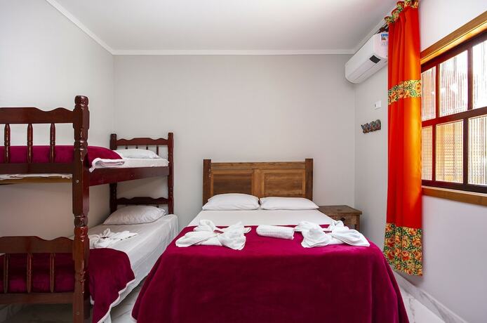 Imagen de la habitación del Hotel Pousada Guarubela Veloso. Foto 19