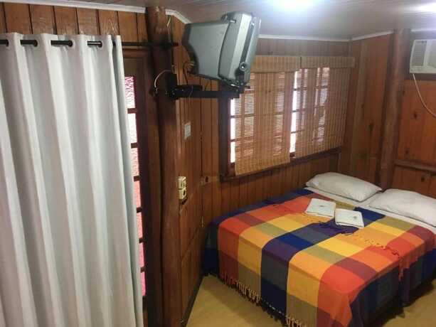 Imagen de la habitación del Hotel Pousada Halliny do Rosa. Foto 19