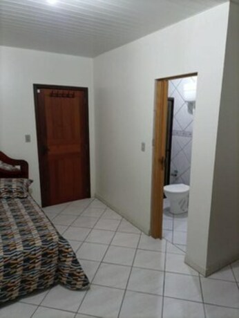 Imagen de la habitación del Hotel Pousada Hangar 310. Foto 17