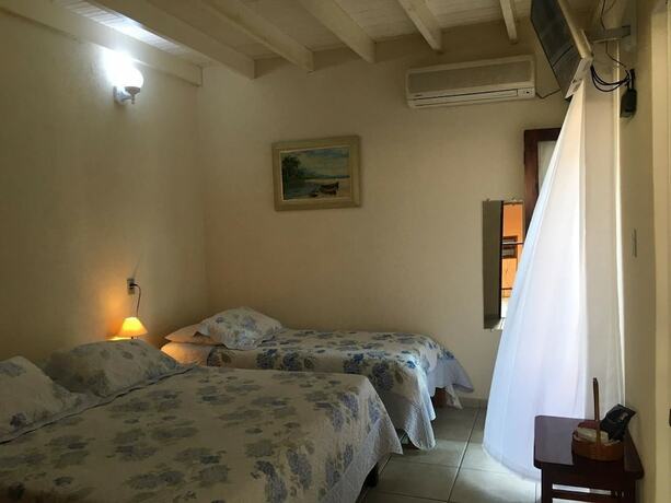 Imagen de la habitación del Hotel Pousada Irmaos do Mar. Foto 16