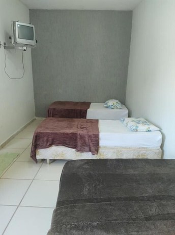 Imagen de la habitación del Hotel Pousada Itagua&ccedil;u. Foto 19