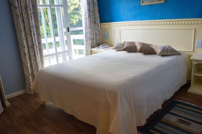 Imagen de la habitación del Hotel Pousada Jardim Azul. Foto 11