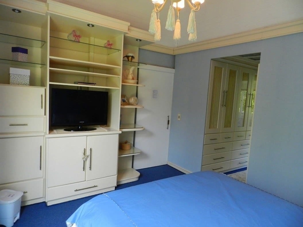 Imagen de la habitación del Hotel Pousada Jardim Azul. Foto 14