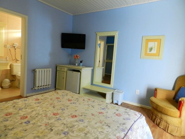 Imagen de la habitación del Hotel Pousada Jardim Azul. Foto 15