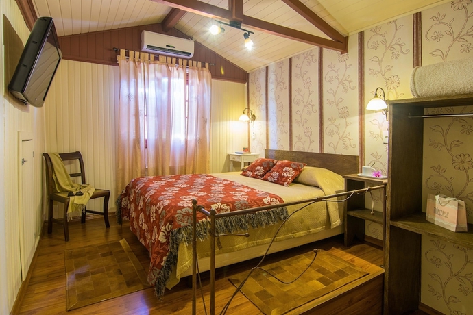 Imagen de la habitación del Hotel Pousada Jardim Secreto. Foto 13