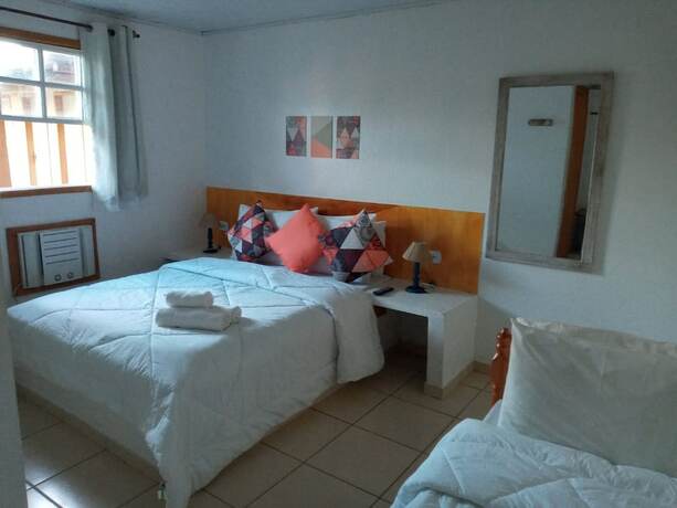 Imagen de la habitación del Hotel Pousada Jardim de Buzios. Foto 16