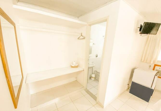 Imagen de la habitación del Hotel Pousada Jardim de Buzios. Foto 17