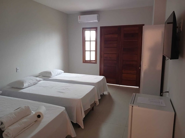Imagen de la habitación del Hotel Pousada Jubarte. Foto 7