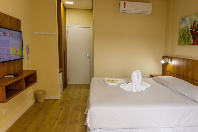 Imagen de la habitación del Hotel Pousada Kaliman Casal Luxo. Foto 19