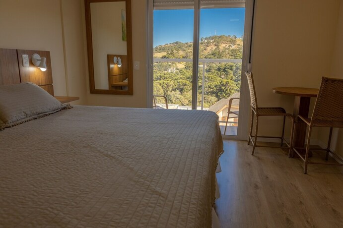 Imagen de la habitación del Hotel Pousada Kaliman Casal Luxo. Foto 20