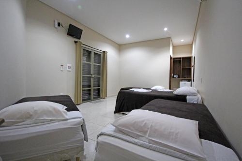 Imagen de la habitación del Hotel Pousada Kaluan&atilde;. Foto 6