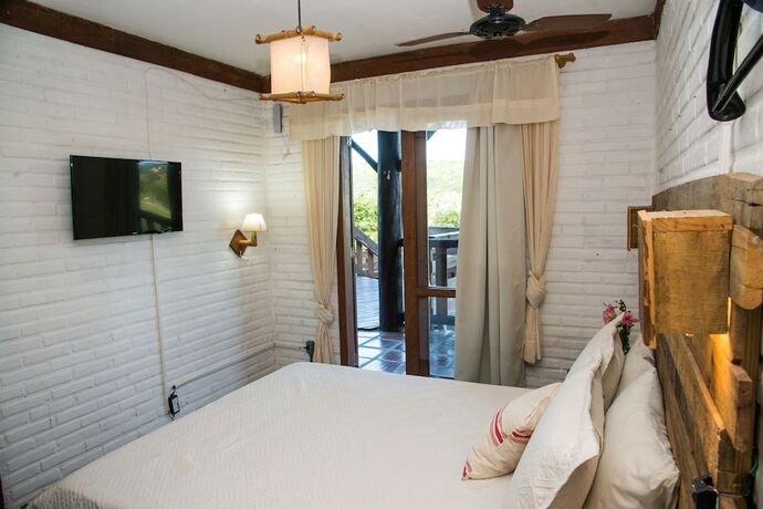 Imagen de la habitación del Hotel Pousada La Creacion. Foto 5