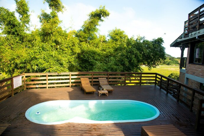 Imagen de la piscina del Hotel Pousada La Creacion. Foto 15