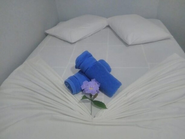 Imagen de la habitación del Hotel Pousada La Ferrugem Suites. Foto 20