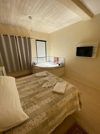 Imagen de la habitación del Hotel Pousada La Sierra. Foto 28
