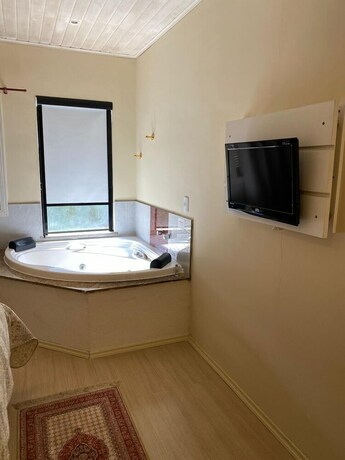 Imagen de la habitación del Hotel Pousada La Sierra. Foto 30