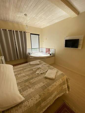 Imagen de la habitación del Hotel Pousada La Sierra. Foto 31