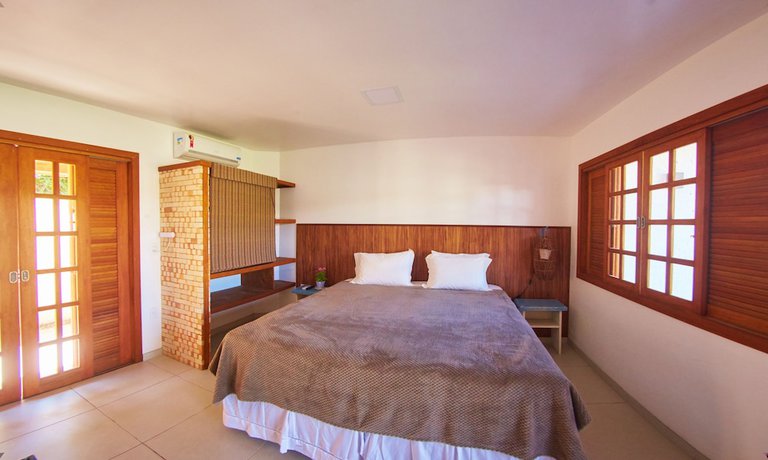 Imagen de la habitación del Hotel Pousada Lagoa do Rosa. Foto 4